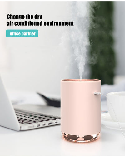 White cylindrical USB humidifier with a power button and a clear base, suitable for car or desktop use. - Image 9