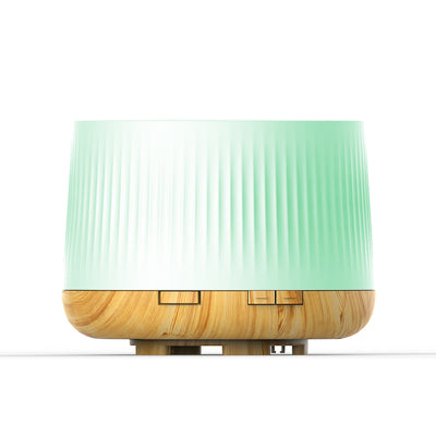 White essential oil aromatherapy machine and ultrasonic humidifier with a ribbed texture and control buttons. - Image 4