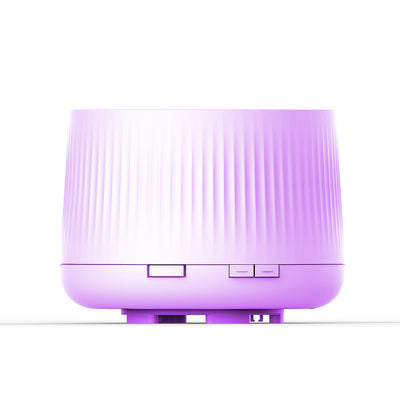 White essential oil aromatherapy machine and ultrasonic humidifier with a ribbed texture and control buttons.