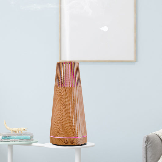 Dark wood grain electric essential oil aroma diffuser with a ribbed conical shape and LED light ring. - Image 2