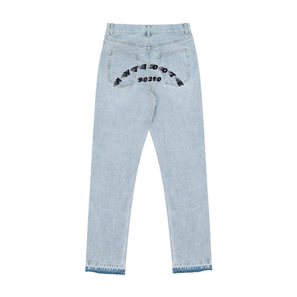Jeans Rectos Azul Lavado con Bordes Deshilachados y Detalles Bordados
