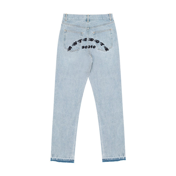 Jeans Rectos Azul Lavado con Bordes Deshilachados y Detalles Bordados