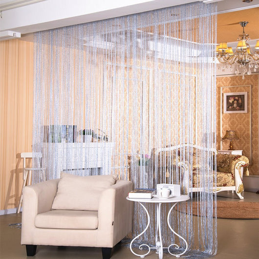 Red string door curtain with a subtle shimmer, used as a room partition in a modern living room. - Image 2