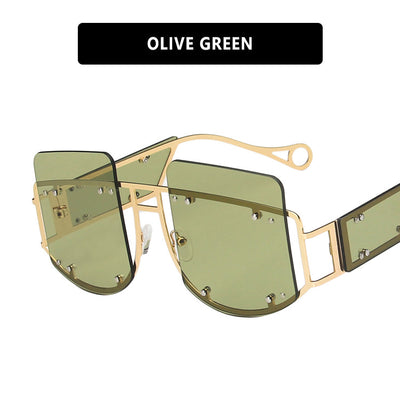 Red oversized rimless sunglasses with a unique geometric design and gold-tone metal temples. - Image 4