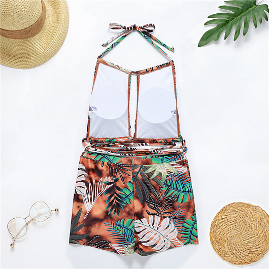 Two-piece bikini with green tropical leaf print, halter top, and high-waisted boxer shorts on a white background. - Image 26