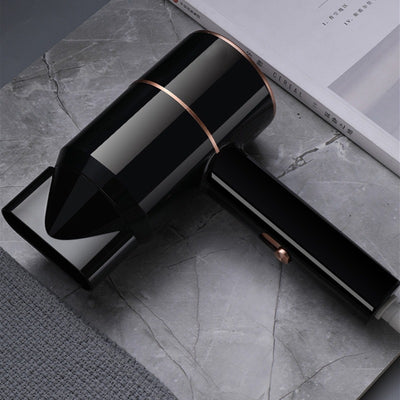 Mini negative ion hair dryer with a pink to purple gradient finish and silver accents, featuring a compact T-shape. - Image 26