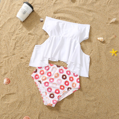 Family matching donut print swimsuits including men's shorts, boy's trunks, women's off-shoulder bikini, and girl's one-piece. - Image 13