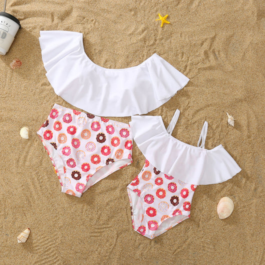 Family matching donut print swimsuits including men's shorts, boy's trunks, women's off-shoulder bikini, and girl's one-piece. - Image 4