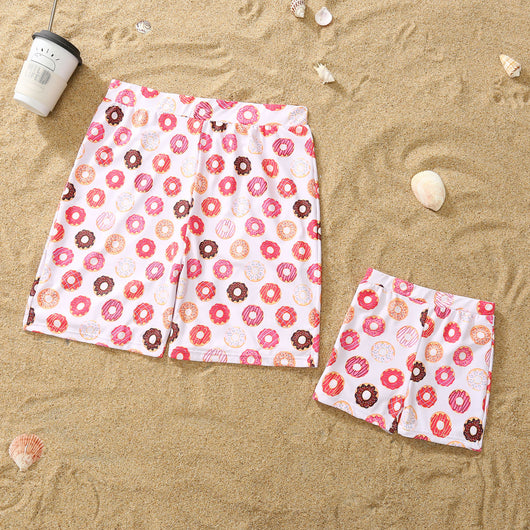 Family matching donut print swimsuits including men's shorts, boy's trunks, women's off-shoulder bikini, and girl's one-piece. - Image 7