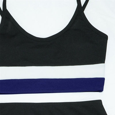 Women's color block ribbed two-piece swimsuit in navy blue, orange, and white with a high-waisted bottom. - Image 4