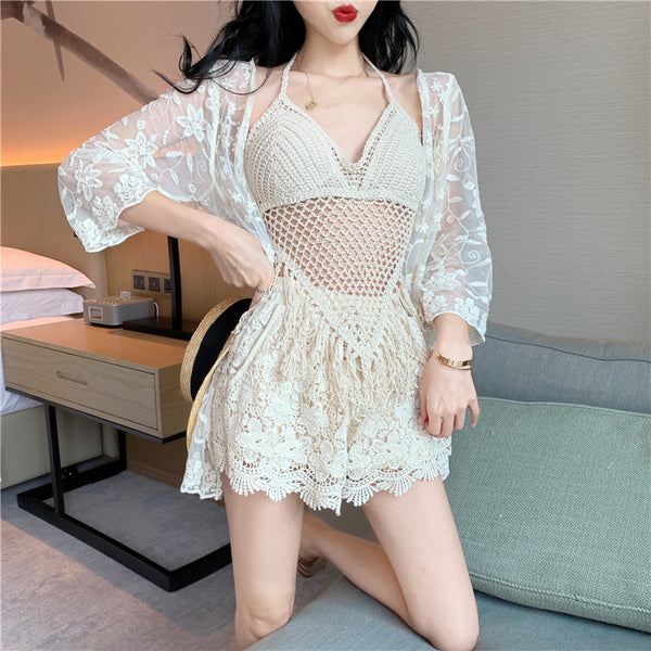 Light beige knitted halter top and fringed skirt swimsuit with sheer floral lace kimono cover-up.