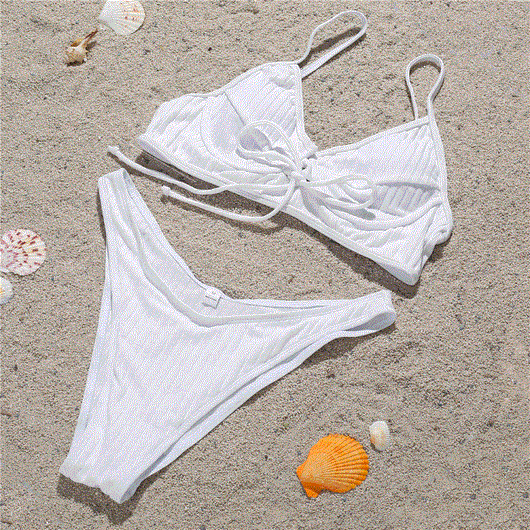 White ribbed bikini swimsuit with a tie-front underwire top and matching high-cut bottoms, modeled by a woman. - Image 7
