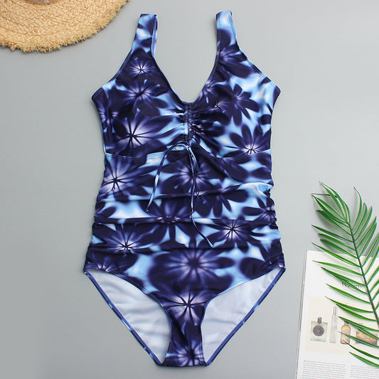 Plus size one-piece swimsuit with blue and white floral digital print, V-neck, and ruched front. - Image 2