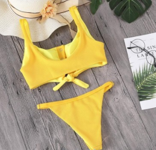 Red two-piece bikini with a square neck, button-front tie top, and high-cut bottoms on a wooden background. - Image 5