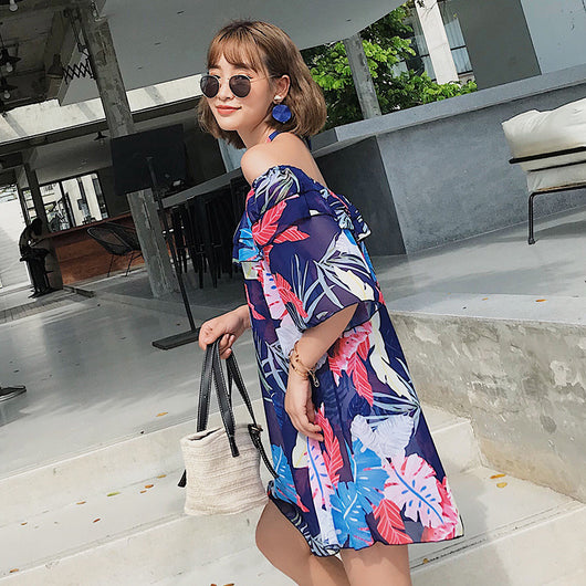 Women's three-piece swimsuit set with a navy blue tropical leaf print bikini and matching off-the-shoulder cover-up. - Image 7