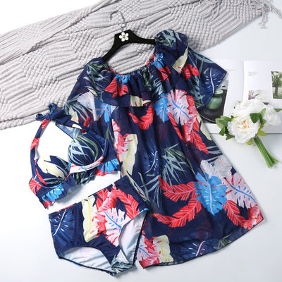Women's three-piece swimsuit set with a navy blue tropical leaf print bikini and matching off-the-shoulder cover-up. - Image 8
