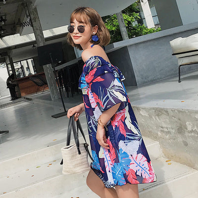 Women's three-piece swimsuit set with a navy blue tropical leaf print bikini and matching off-the-shoulder cover-up. - Image 4