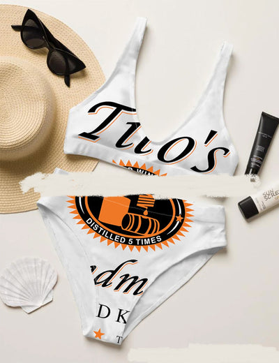 Printed high-waisted triangle split swimsuit with a black, white, and grey geometric pattern.