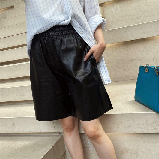Pantalones de Cuero Negro con Cintura Alta y Elástico - Image 3