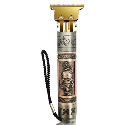 Professional electric hair clipper with gold T-blade, bronze and silver decorative handle, and black wrist strap. - Image 3