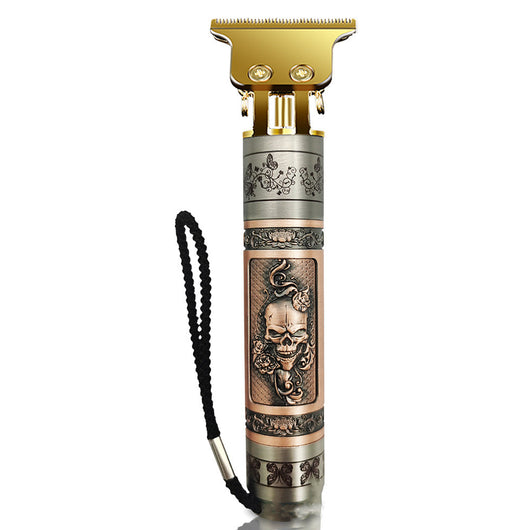 Professional electric hair clipper with gold T-blade, bronze and silver decorative handle, and black wrist strap. - Image 3