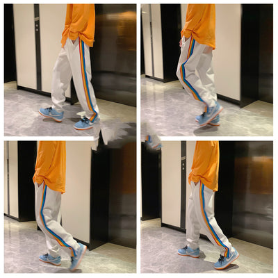 Pantalones Deportivos Casuales con Cierre Lateral y Rayas Arcoíris para Hombre y Mujer - Image 8