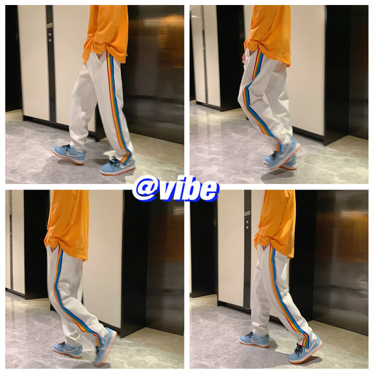 Pantalones Deportivos Casuales con Cierre Lateral y Rayas Arcoíris para Hombre y Mujer - Image 9