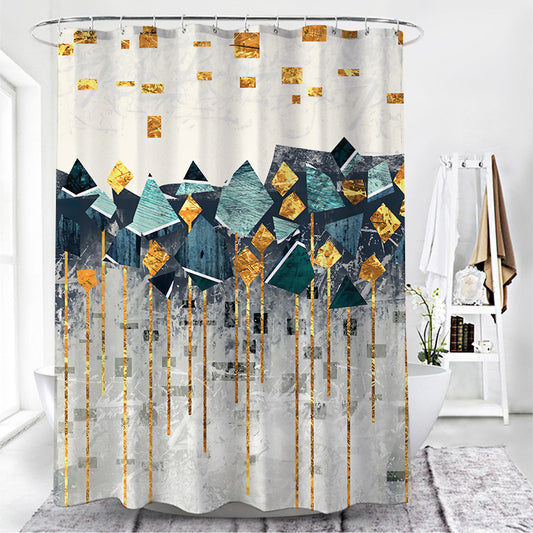 Modern shower curtain with a geometric gold hexagon pattern over a gradient of green leaves.