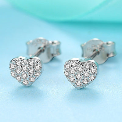 Sterling silver heart-shaped stud earrings with pavé clear zircons, featuring butterfly backings. - Image 9