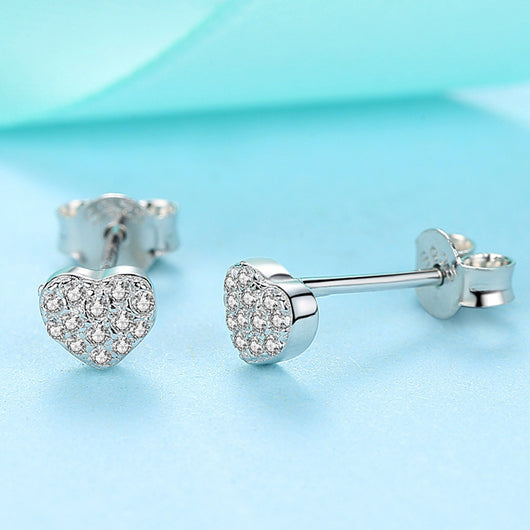 Sterling silver heart-shaped stud earrings with pavé clear zircons, featuring butterfly backings. - Image 5