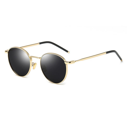 Women's retro round frame polarized sunglasses with gold metal frames, brown lenses, and orange temple tips. - Image 13