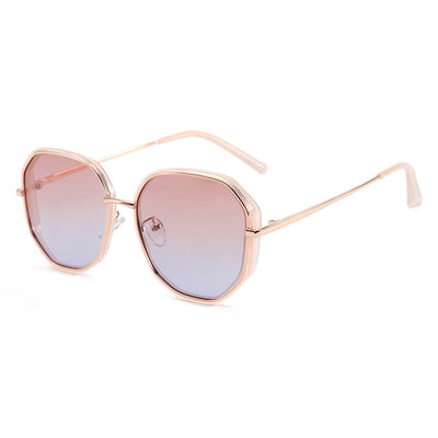 Ladies' rose gold-toned octagonal polarized sunglasses with gradient gray lenses on a white background. - Image 9