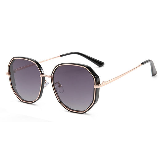 Ladies' rose gold-toned octagonal polarized sunglasses with gradient gray lenses on a white background.
