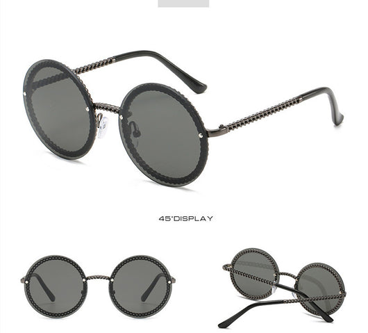 Frameless round sunglasses with pink gradient lenses and gold-tone chain detail on temples and lens edges. - Image 6