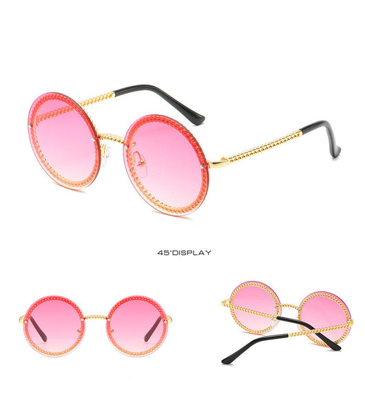Frameless round sunglasses with pink gradient lenses and gold-tone chain detail on temples and lens edges. - Image 10