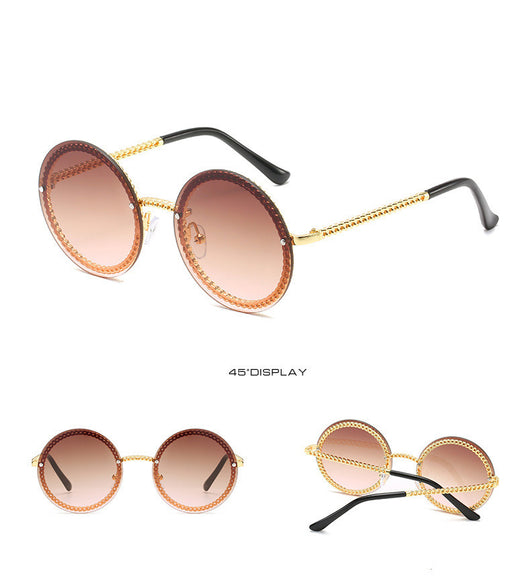 Frameless round sunglasses with pink gradient lenses and gold-tone chain detail on temples and lens edges. - Image 8