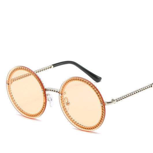 Frameless round sunglasses with pink gradient lenses and gold-tone chain detail on temples and lens edges. - Image 5