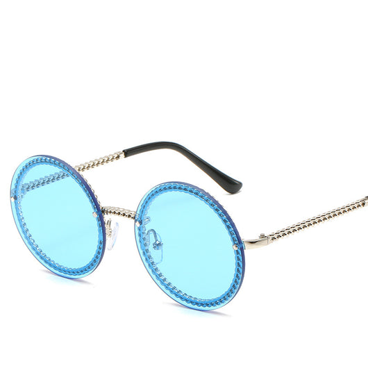 Frameless round sunglasses with pink gradient lenses and gold-tone chain detail on temples and lens edges. - Image 4
