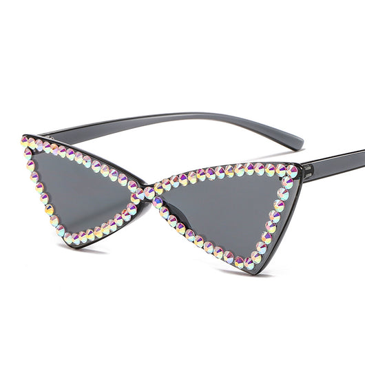 Pink retro triangle rimless sunglasses with iridescent rhinestone embellishments and a cat-eye shape. - Image 11