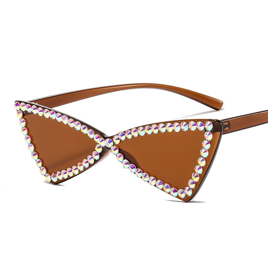 Pink retro triangle rimless sunglasses with iridescent rhinestone embellishments and a cat-eye shape. - Image 6