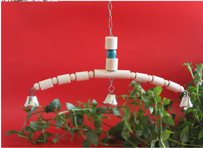 Wooden bird chew toy with a curved perch made of beads and cylinders, featuring three silver bells and a blue accent bead, hanging from a metal chain. - Image 2