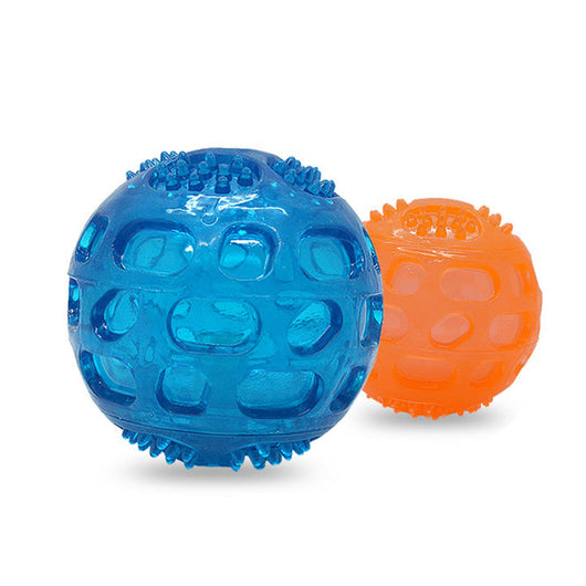 Translucent blue rubber dog toy ball with textured nubs and recessed areas for chewing and teeth cleaning. - Image 11