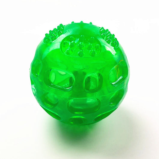 Translucent blue rubber dog toy ball with textured nubs and recessed areas for chewing and teeth cleaning. - Image 7