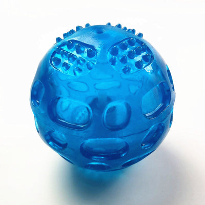 Translucent blue rubber dog toy ball with textured nubs and recessed areas for chewing and teeth cleaning. - Image 8