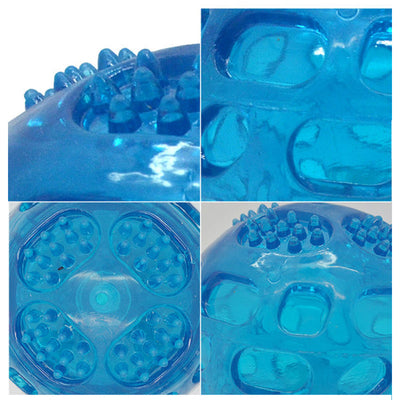 Translucent blue rubber dog toy ball with textured nubs and recessed areas for chewing and teeth cleaning. - Image 3