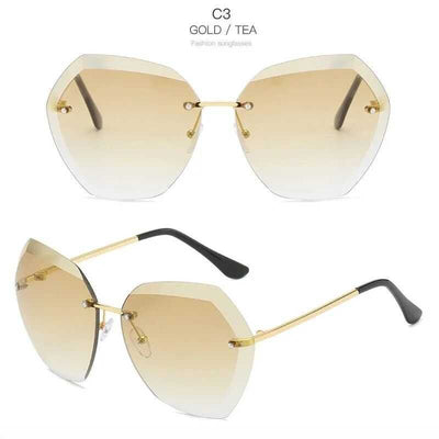 Women's rimless oversized sunglasses with gradient brown lenses and clear, purple, and blue rhinestone embellishments. - Image 13