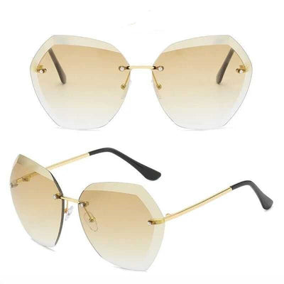 Women's rimless oversized sunglasses with gradient brown lenses and clear, purple, and blue rhinestone embellishments. - Image 4