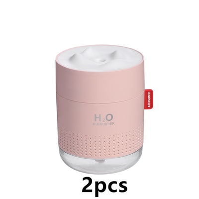 White cylindrical USB charging desktop humidifier with a clear base and a textured snow mountain top. Features 'H₂O HUMIDIFIER' text and a red tag. - Image 10