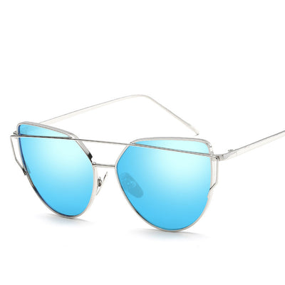 Black cat eye reflective women's sunglasses with dark lenses and a sleek metal frame, featuring a double bridge. - Image 10