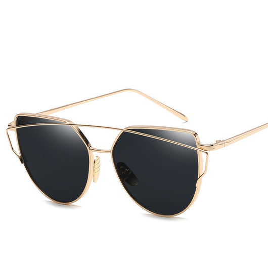 Black cat eye reflective women's sunglasses with dark lenses and a sleek metal frame, featuring a double bridge. - Image 6
